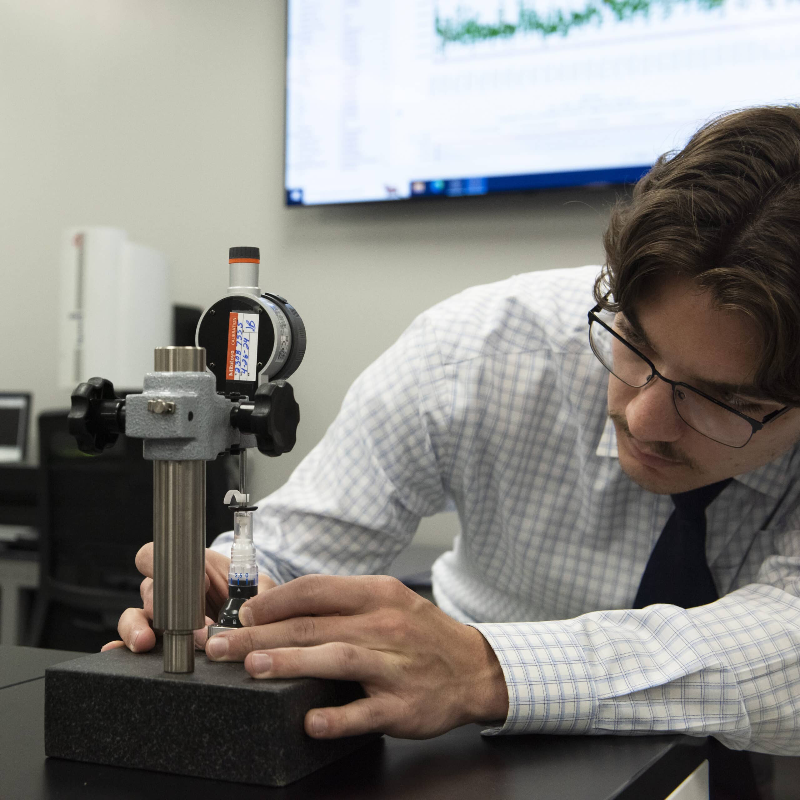 Engineer Using Testing Equipment